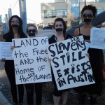 women protest sex slavery in Austin